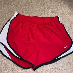 Red Nike shorts